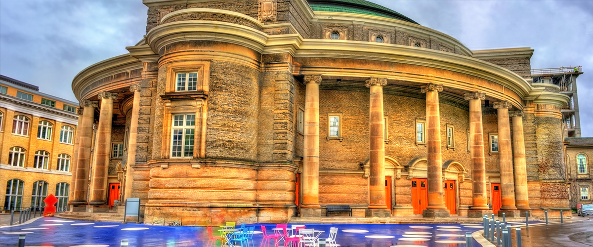 An exterior saturated and colourful photo of Convocation Hall shortly after the rain