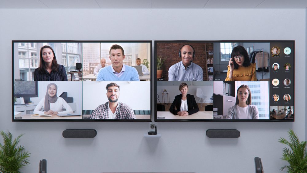 Dual-monitor configuration to show meeting content and remote attendees