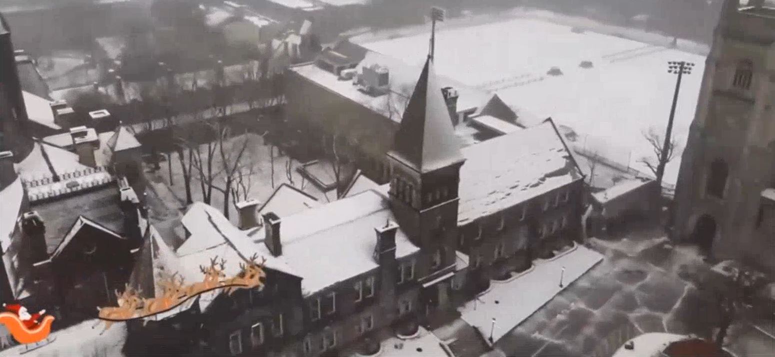 an illustration of Santa with reindeer flying over the St. George campus